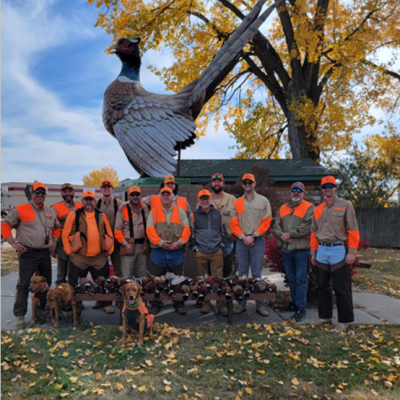 Hannon hunter group posing in front of their kill