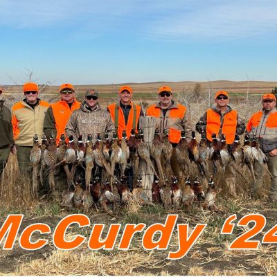 McCurdy family in front of their hunted pheasants